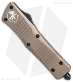Microtech Combat Troodon Bowie OTF Knife Tan (3.8" Black Serr) 146-2TA -Blade HQ Shop Microtech Combat Troodon Bowie tan black serr BHQ 71440 er spine