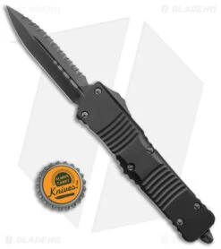 Microtech Combat Troodon D/E OTF Auto Knife Shadow Black (3.8" Black Full Serr) -Blade HQ Shop Microtech Combat Troodon DE Shadow OTF Auto Black Black Full Serr BHQ 146592 jr bottlecap