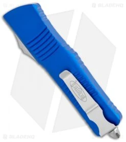 Microtech Combat Troodon OTF Knife D/E Dagge Blue (3.8" Stonewash Serr) 142-11BL -Blade HQ Shop Microtech Combat Troodon OTF DE Dagger Blue SW Serr 142 11BL BHQ 98057 jr side