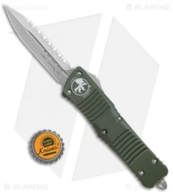 Microtech Combat Troodon OTF Knife D/E Dagger OD Green (3.8" SW Full Serr) 9 Microtech Combat Troodon OTF Knife D/E Dagger OD Green (3.8" SW Full Serr) -Blade HQ Shop Microtech Combat Troodon OTF DE Dagger OD Green SW Full Serr 142 12OD BHQ 98064 jr bottlecap 1