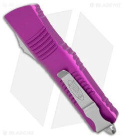Microtech Combat Troodon OTF Knife D/E Dagger Violet (3.8" SW Full Serr) -Blade HQ Shop Microtech Combat Troodon OTF DE Dagger Violet SW Full Serr BHQ 98068 jr side