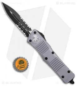 Microtech Combat Troodon OTF D/E Automatic Knife Gray (3.8" Black Serr) -Blade HQ Shop Microtech Combat Troodon OTF Dagger Auto Gray Black Serr BHQ 98074 jr bottlecap