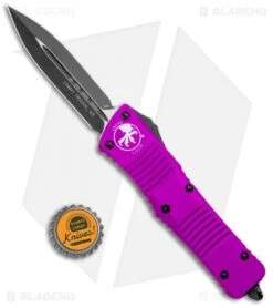 Microtech Combat Troodon OTF D/E Dagger Knife Violet (3.8" Black Plain) 9 Microtech Combat Troodon OTF D/E Dagger Knife Violet (3.8" Black Plain) -Blade HQ Shop Microtech Combat Troodon OTF Dagger Violet Black 142 1VI BHQ 98073 jr bottlecap