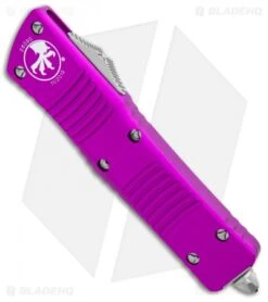 Microtech Combat Troodon OTF Knife D/E Dagger Violet (3.8" Satin Serr) -Blade HQ Shop Microtech Combat Troodon OTF Dagger Violet Satin Serr 142 5VI BHQ 98095 jr spine