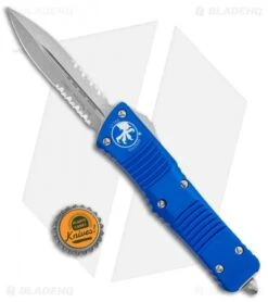 Microtech Combat Troodon OTF Knife D/E Dagge Blue (3.8" Stonewash Serr) 142-11BL -Blade HQ Shop Microtech Combat Troodon OTF Knife D E Dagge Blue 3.8inStonewash Serr 142 11BL BHQ 98057 Botllecap