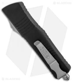 Microtech Combat Troodon S/E OTF Automatic Knife (3.8" Black Serr) 143-2 8 Microtech Combat Troodon S/E OTF Automatic Knife (3.8" Black Serr) 143-2 -Blade HQ Shop Microtech Combat Troodon SE OTF Auto Black Serr 143 2 BHQ 23824 jr side