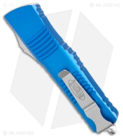 Microtech Combat Troodon S/E OTF Automatic Knife Blue (3.8" Stonewash) 8 Microtech Combat Troodon S/E OTF Automatic Knife Blue (3.8" Stonewash) -Blade HQ Shop Microtech Combat Troodon SE OTF Blue SW BHQ 98101 jr side