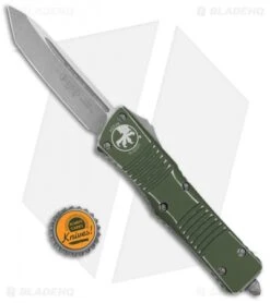 Microtech Combat Troodon Tanto OTF Automatic Distressed OD Green (4" Apoc) -Blade HQ Shop Microtech Combat Troodon TE OTF Auto Tanto Distress Green Apocalyptic BHQ 131517 jr bottlecap