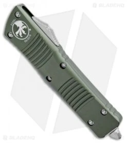 Microtech Combat Troodon T/E Automatic OTF Knife OD Green (3.8" SW Serr) -Blade HQ Shop Microtech Combat Troodon Tanto OD Green SW Serr 144 11OD BHQ 98204 jr spine