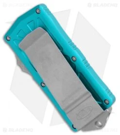 Microtech Exocet Dagger CA Legal OTF Automatic Knife Teal (Apocalyptic) -Blade HQ Shop Microtech Exocert Dagger CA Legal OTF Auto Turquoise Apocalyptic 157 10APTQ BHQ 113378 jr side