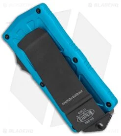 Microtech Exocet Dagger CA Legal OTF Automatic Knife Teal (1.9" Black) -Blade HQ Shop Microtech Exocet Dagger CA Legal OTF Auto Turquoise Black 157 1TQ BHQ 104914 jr side