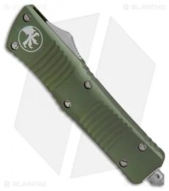 Microtech OD Green Troodon D/E OTF Automatic Knife (3" Satin Serr) 138-5OD 7 Microtech OD Green Troodon D/E OTF Automatic Knife (3" Satin Serr) 138-5OD -Blade HQ Shop Microtech OD Green Troodon DE OTF Auto Satin Serr 138 5OD BHQ 13106 jr spine