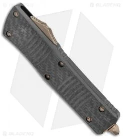 Microtech Signature Series Combat Troodon OTF Knife CF (3.8" Bronze Apocalyptic) -Blade HQ Shop Microtech Signature Series Combat Troodon DE OTF CF Bronze BHQ 135401 jr spine