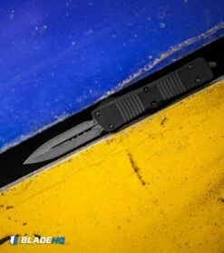 Microtech Signature Series Troodon OTF Knife Ringed Hardware (3" Damascus) -Blade HQ Shop Microtech Signature Series Troodon OTF Knife Ringed Hardware Damascus BHQ 110887 kp colour web