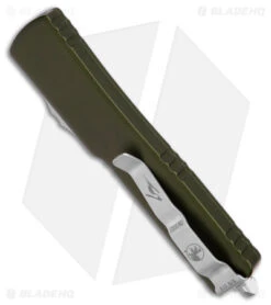 Microtech Signature Series UTX-70 Hellhound Tanto OTF Knife OD Green (2.4" SW) -Blade HQ Shop Microtech Signature Series UTX 70 Hellhound Tanto OTF Knife OD Green 2in SW BHQ 175692 td side