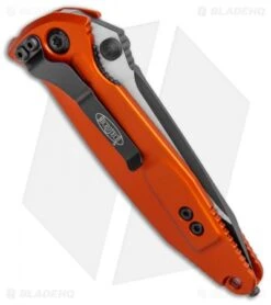 Microtech Socom Elite Tanto Manual Knife Orange/CF (4" Two Tone) 161-1ORCFI 8 Microtech Socom Elite Tanto Manual Knife Orange/CF (4" Two Tone) 161-1ORCFI -Blade HQ Shop Microtech Socom Elite Tanto Manual Orange CF TT 161 1ORCFI BHQ 101661 jr side