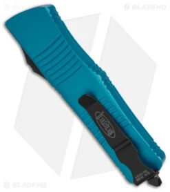 Microtech Troodon D/E OTF Automatic Knife Turquoise (3" Black) 138-1 TQ -Blade HQ Shop Microtech Troodon DE OTF AK Turquoise 3in Black BHQ 146595 td side