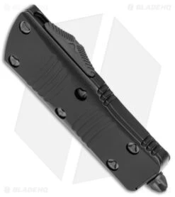 Microtech Troodon Mini D/E CA Legal OTF Auto Black (1.9" Black DLC Serr) -Blade HQ Shop Microtech Troodon Mini DE CA Legal OTF Auto Shadow Black DLC Serr BHQ 146607 jr spine