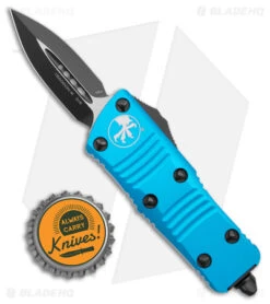 Microtech Troodon Mini D/E OTF Automatic Knife Turquoise (1.9" Black) -Blade HQ Shop Microtech Troodon Mini DE OTF Auto Turquoise Black BHQ 176097 jr bottlecap