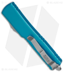 Microtech UTX-70 D/A OTF D/E Automatic Knife Turquoise (Stonewash Full Serr) -Blade HQ Shop Microtech UTX 70 DA OTF DE AK Turquoise SW Full Serr BHQ 98282 td side