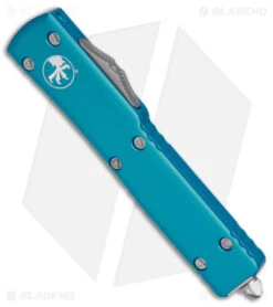 Microtech UTX-70 D/A OTF D/E Automatic Knife Turquoise (Stonewash Full Serr) -Blade HQ Shop Microtech UTX 70 DA OTF DE AK Turquoise SW Full Serr BHQ 98282 td spine