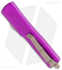 Microtech Signature Series UTX-70 HH Tanto OTF Knife Violet (2.4" Bronze SW) 8 Microtech Signature Series UTX-70 HH Tanto OTF Knife Violet (2.4" Bronze SW) -Blade HQ Shop Microtech UTX 70 HH Tanto OTF Violet Bronze SW 419 13VIS BHQ 112170 jr side