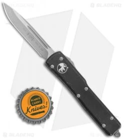 Microtech UTX-70 S/E OTF Automatic Distressed Black (2.4" Stonewash) 148-10DBK -Blade HQ Shop Microtech UTX 70 SE OTF Auto Diestressed Black SW 148 10DBK BHQ 120248 jr bottlecap