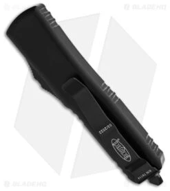 Microtech UTX-85 D/E OTF Auto Knife Black Dagger (3.125" Black Serr) 232-3T -Blade HQ Shop Microtech UTX 85 D E OTF Auto Knife Black Dagger 3in Serr Black BHQ 142701 td side