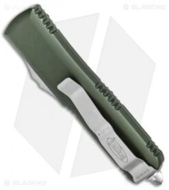 Microtech UTX-85 D/E OTF Automatic Knife OD Green (3.125" Satin) 232-4OD -Blade HQ Shop Microtech UTX 85 DE OTF OD Green Satin 232 4 OD BHQ 80384 jr side
