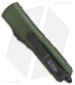 Microtech UTX-85 S/E OTF Automatic Knife OD Green (3.125" Black Serr) 231-2OD -Blade HQ Shop Microtech UTX 85 SE OD Green black serr 231 2OD BHQ 69047 er side