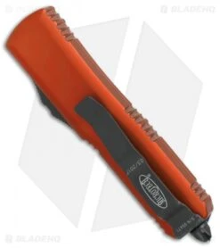 Microtech UTX-85 S/E OTF Automatic Knife Orange (3.125" Black Serr) 231-2OR -Blade HQ Shop Microtech UTX 85 SE orange black serr 231 2OR BHQ 69048 er side