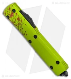 Microtech Ultratech D/E OTF Knife Zombie Tech (3.4" Black Serr) 7 Microtech Ultratech D/E OTF Knife Zombie Tech (3.4" Black Serr) -Blade HQ Shop Microtech Ultratech D E OTF Knife Zombie Tech CC 3.4 Black Serr 122 3Z BHQ 13381 LS Spine 2