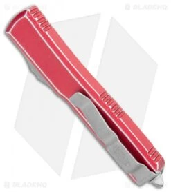 Microtech Ultratech D/E OTF Automatic Knife Distressed Red (3.4" SW Full Serr) 8 Microtech Ultratech D/E OTF Automatic Knife Distressed Red (3.4" SW Full Serr) -Blade HQ Shop Microtech Ultratech DE OTF Auto Distressed Red SW Full Serr 122 12DRD BHQ 108179 jr side