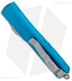 Microtech Ultratech D/E OTF Automatic Knife Turquoise CC (3.4" Apocalyptic) -Blade HQ Shop Microtech Ultratech DE OTF Auto Turquoise CC Apocalyptic 122 10APTQ BHQ 95159 jr side