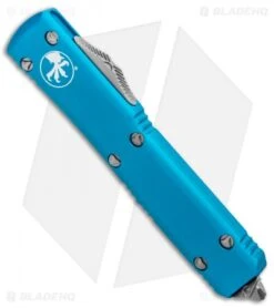 Microtech Ultratech D/E OTF Automatic Knife Turquoise CC (3.4" Apocalyptic) -Blade HQ Shop Microtech Ultratech DE OTF Auto Turquoise CC Apocalyptic 122 10APTQ BHQ 95159 jr spine