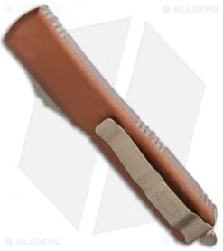 Microtech Ultratech S/E OTF Automatic Black (3.4" Bronze Apocalyptic) 121-13APTA -Blade HQ Shop Microtech Ultratech TE OTF Automatic Black 3.4 Bronze Apocalyptic 121 13APTA BHQ 116824 LS Side