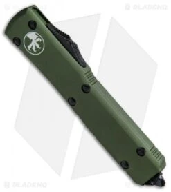 Microtech Ultratech T/E OTF Automatic Knife OD Green CC (3.4" Black Serr) 6 Microtech Ultratech T/E OTF Automatic Knife OD Green CC (3.4" Black Serr) -Blade HQ Shop Microtech Ultratech TE OTF OD Green Black Serr 123 2CCOD BHQ 50987 jr spine