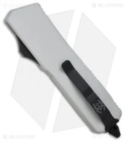 Microtech Scarab Executive Silver OTF Tanto Knife (3.5" Black Plain) 108-1W -Blade HQ Shop microtech scarab te white black serr 108 2w back